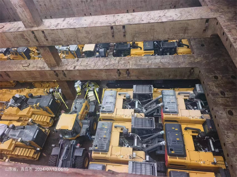 Used Vehicle Export in Progress: Fleet Being Loaded for Overseas Shipment