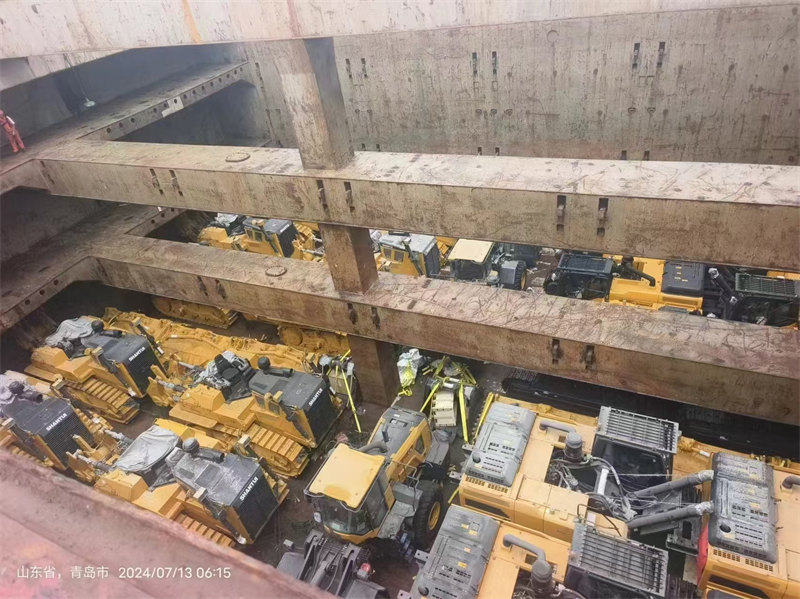 Used Vehicle Export in Progress: Fleet Being Loaded for Overseas Shipment